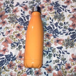 Orange swig bottle